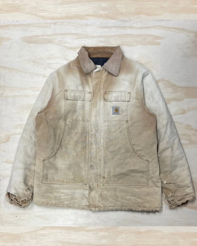 Distressed Carhartt workwear jacket on display at Kensington Flea Market Toronto