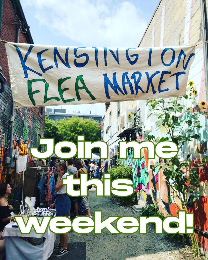 Kensington Flea market alley setup, vintage clothes stalls