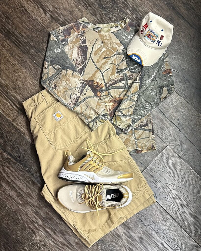 Camo long sleeve with khaki Carhartt shorts and Nike iD sneakers styled for Toronto Night Market
