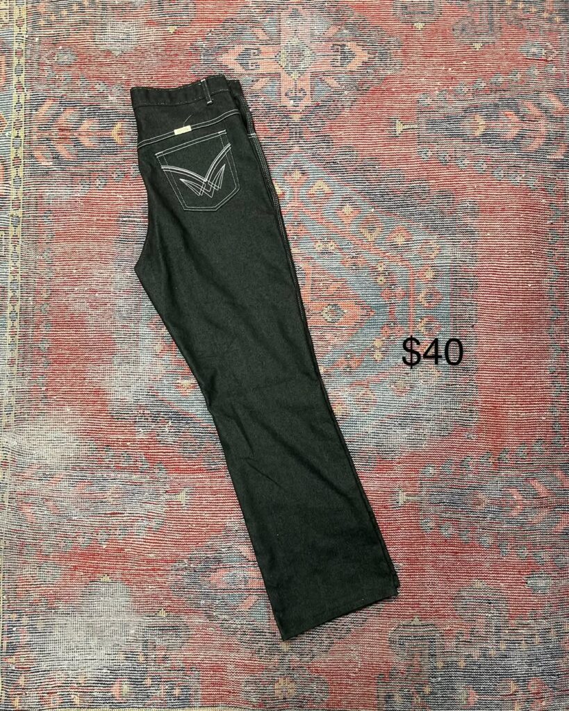 Black embroidered back-pocket jeans $40
