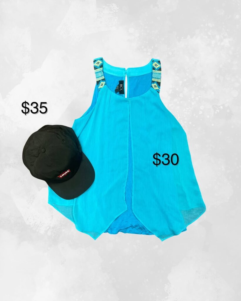 Bright blue sleeveless top $30 with Levi’s cap $35