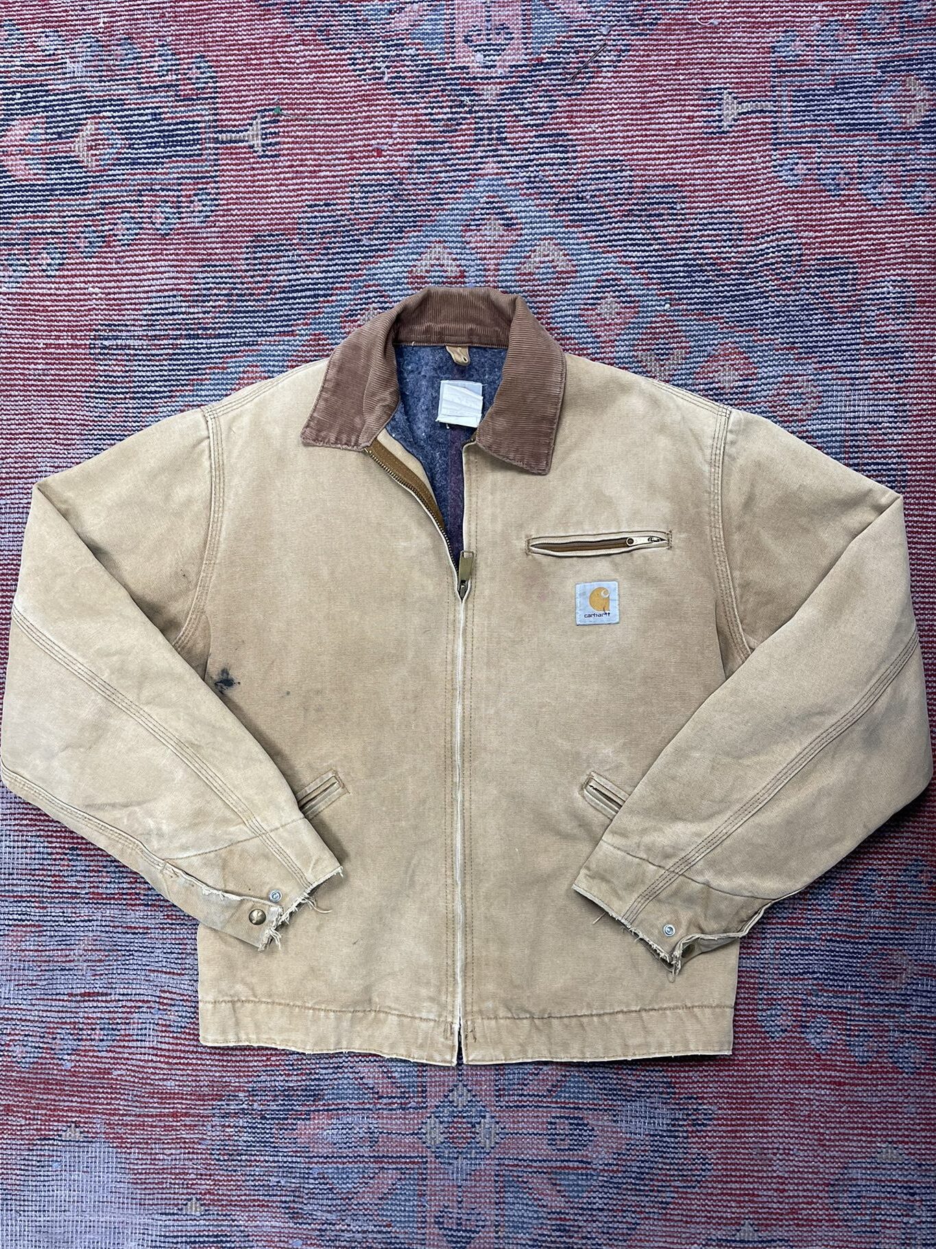 Vintage Carhartt tan chore jacket with corduroy collar – used and workwear style